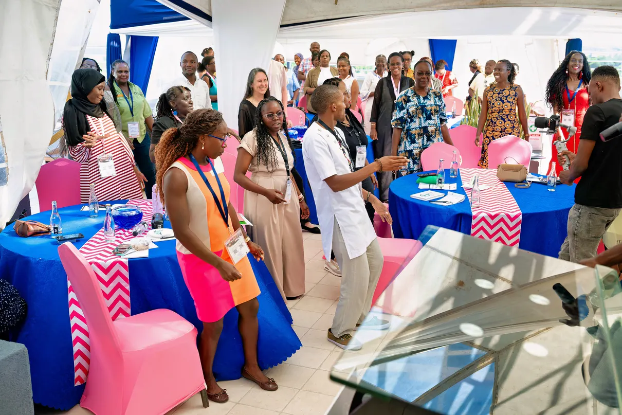 Delegates applauding during a WEConnect session